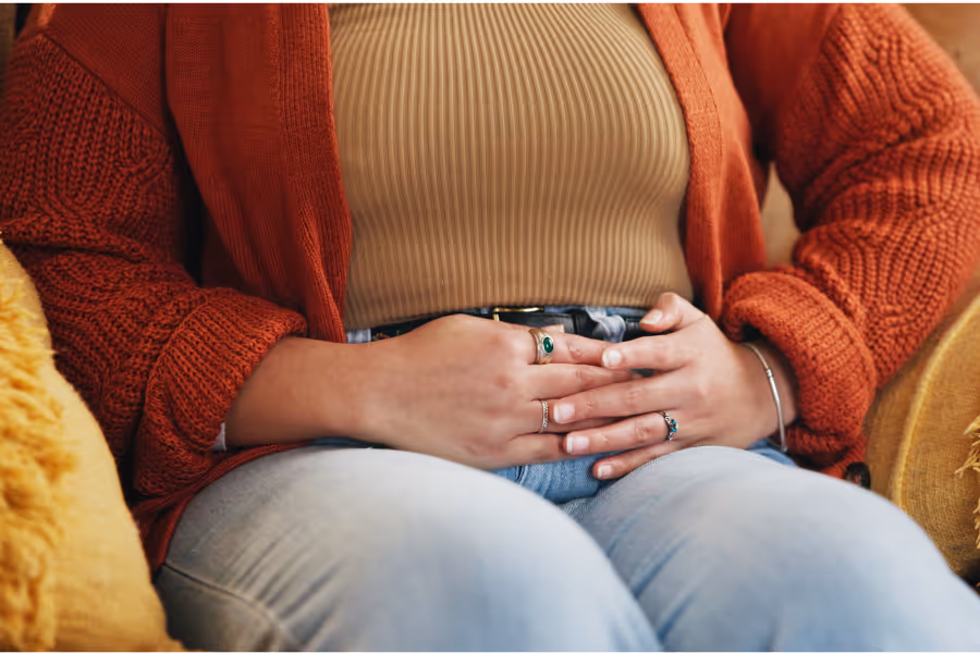 Woman with pelvic organ prolapse discomfort