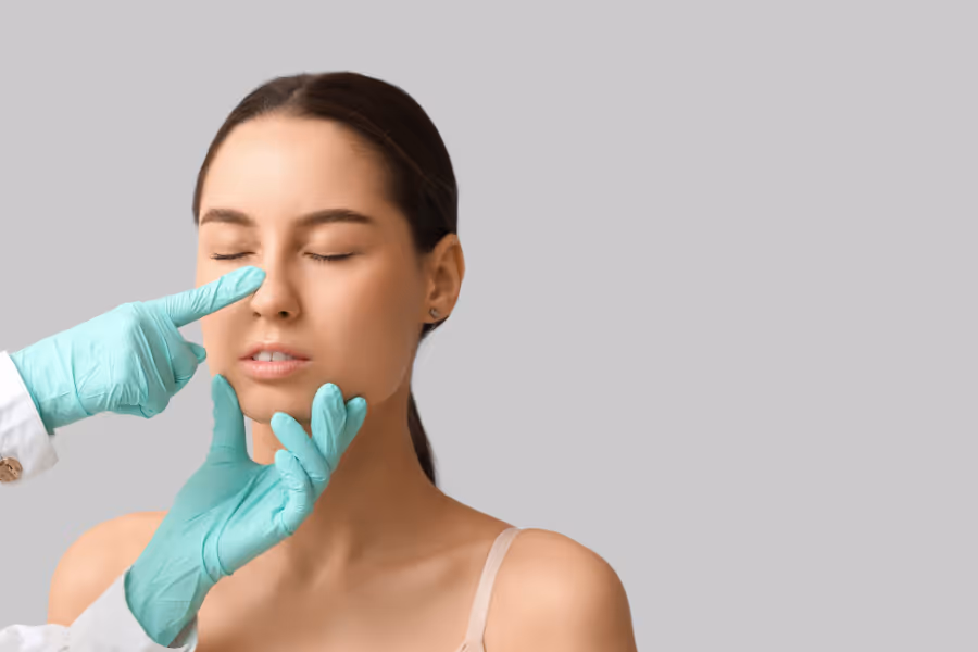 Woman having nose checked by ENT 