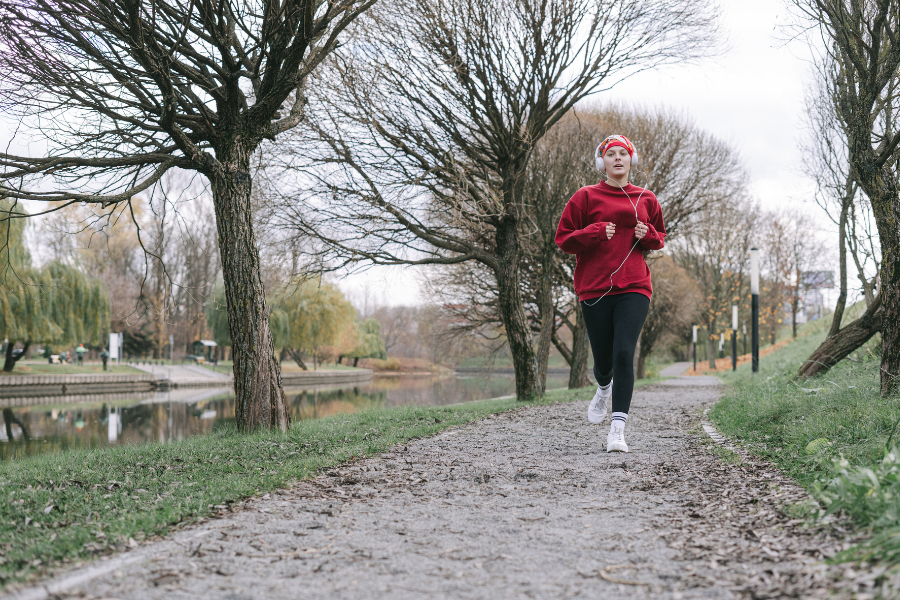 Woman running confidently post-surgery