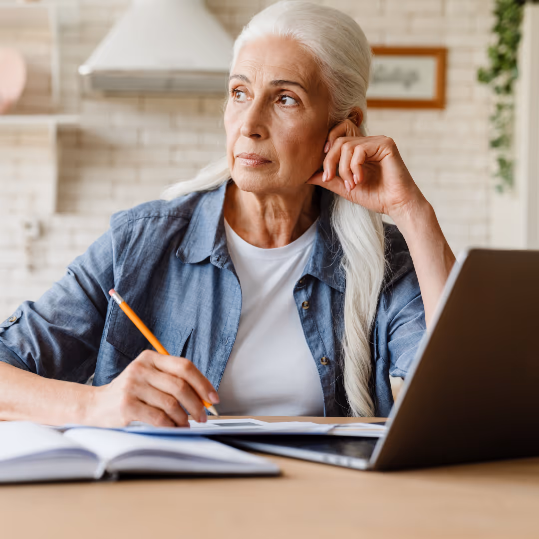 Woman trying to book private surgery in canada on her kitchen counter
