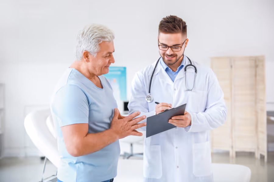 Patient discussing urinary fistula repair with surgeon