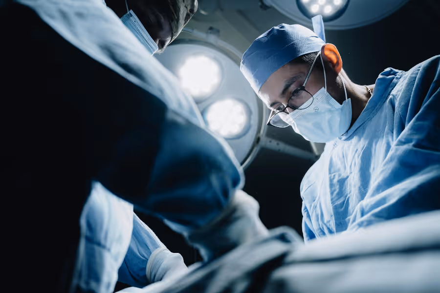 Surgical team performing sleep apnea surgery