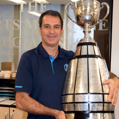 Dr. Rick Zarnette holding. atrophy