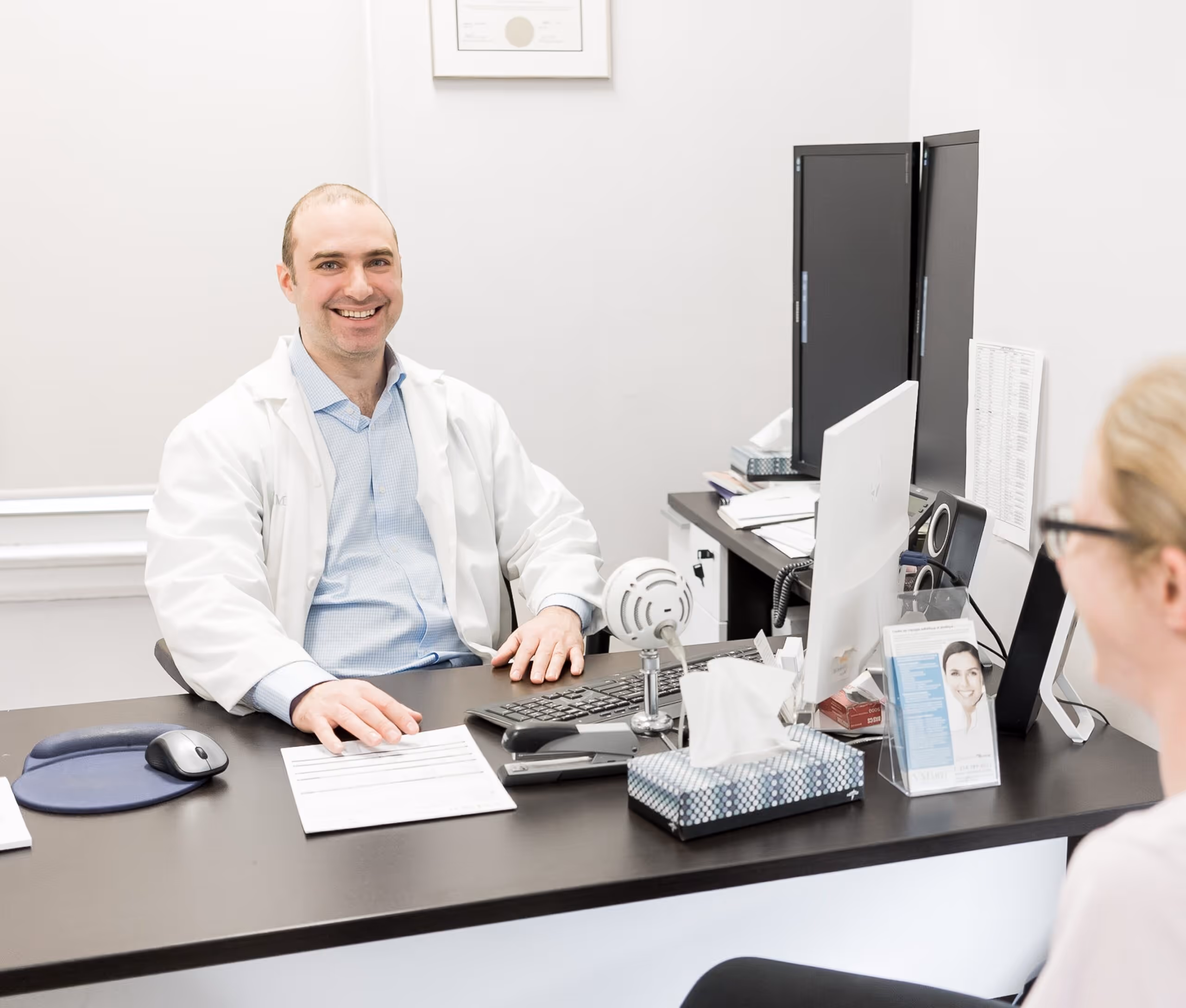 Dr. Benay with a patient