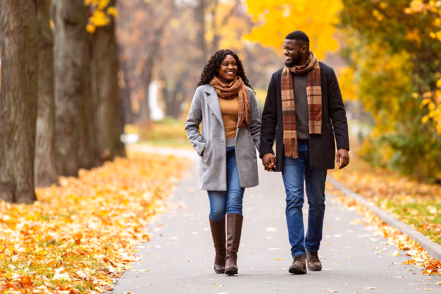 Couple walking happy after core muscle repair surgery