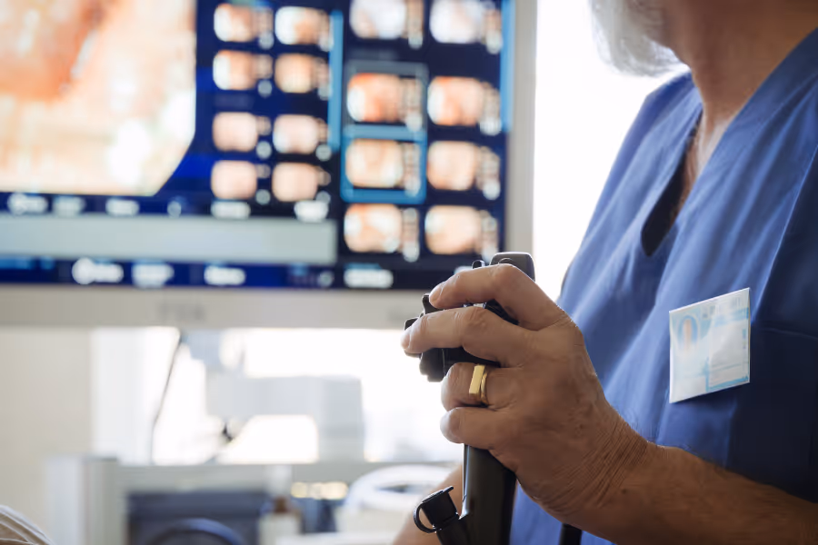 Private colorectal surgeon performing endoscopy