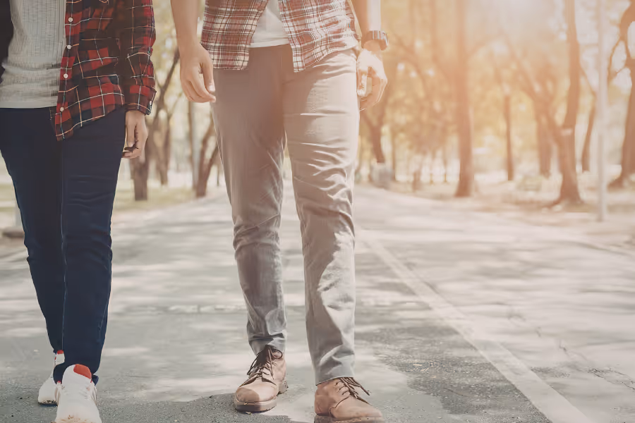 Couple walking happy and confident after adult circumcision