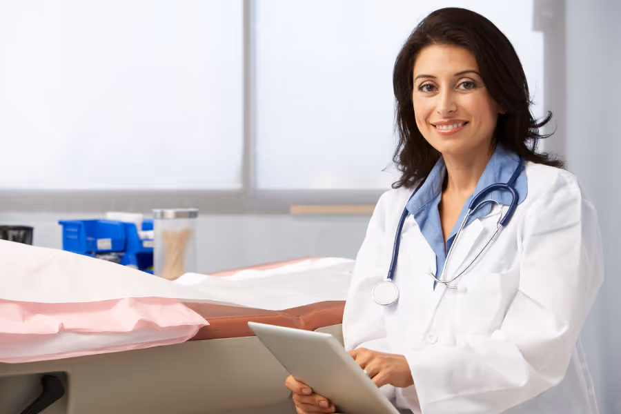Female cosmetic surgeon smiling in office setting