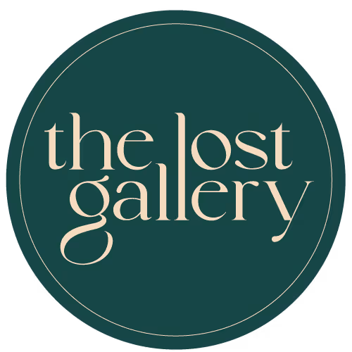 The Lost Gallery logo with stylized text inside a dark green circle.
