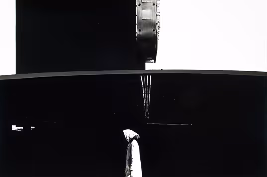 Untitled, [Woman by Parking Garage]