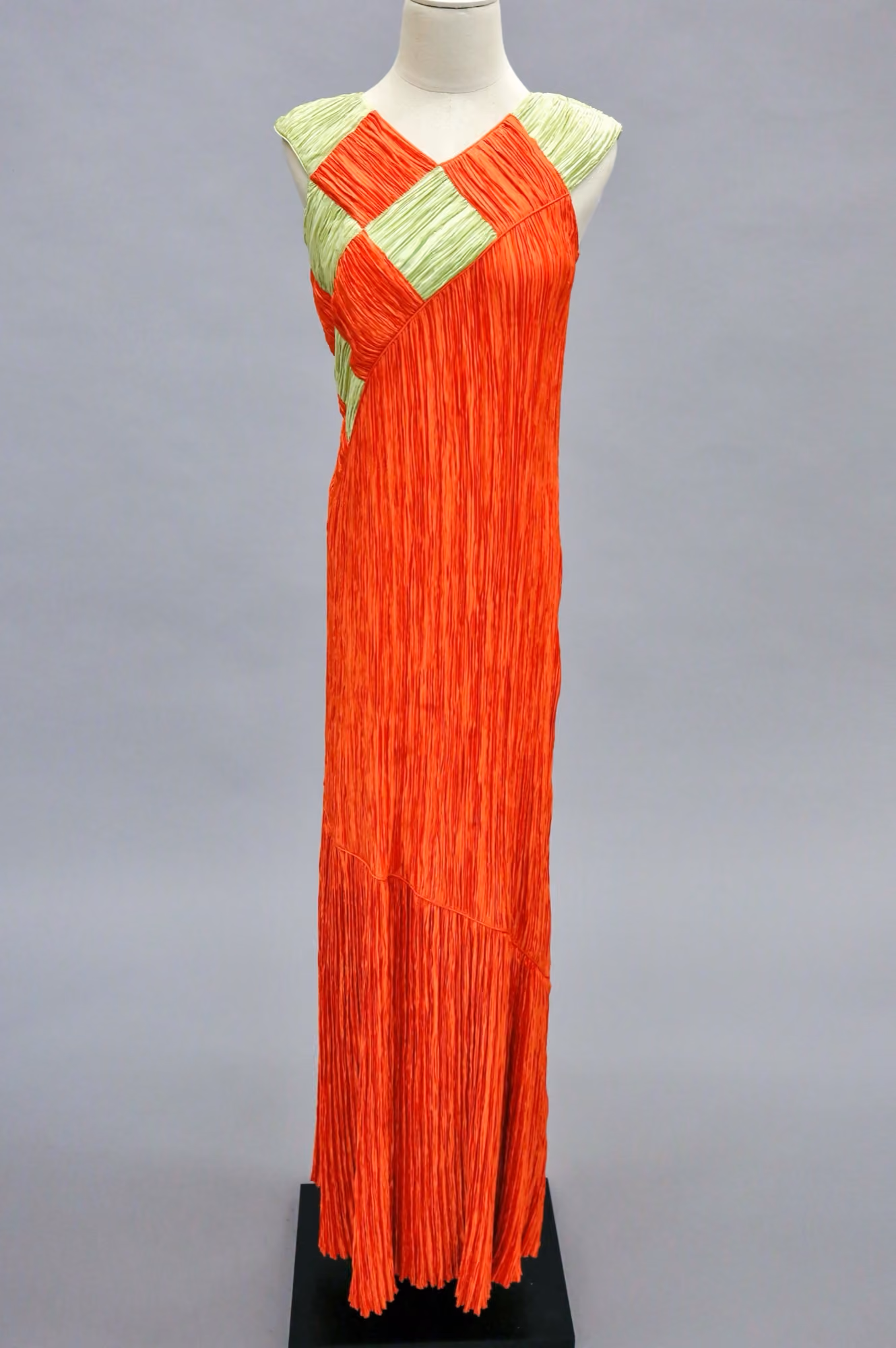 Orange & green pleated evening gown