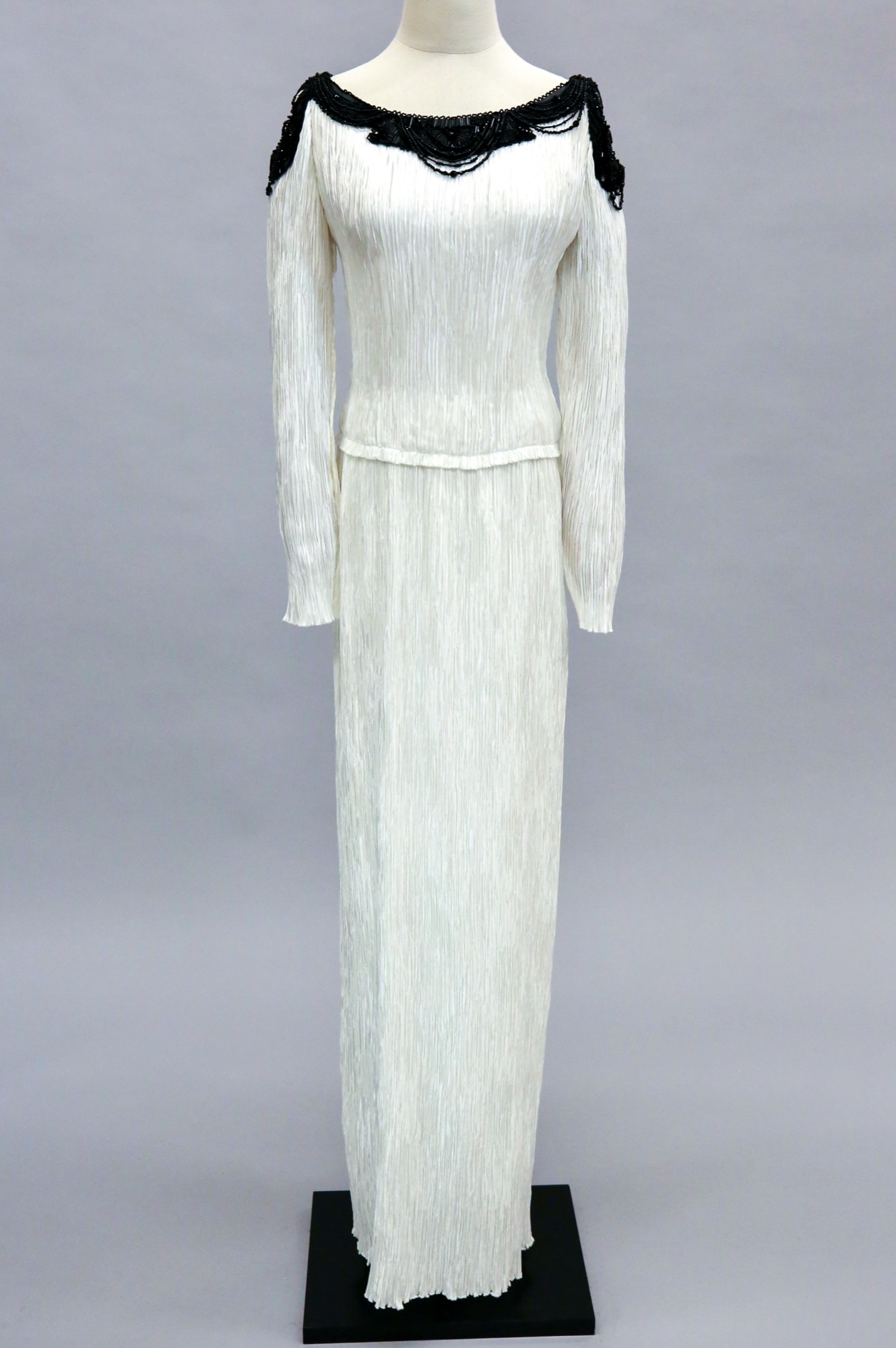 White & black pleated evening gown