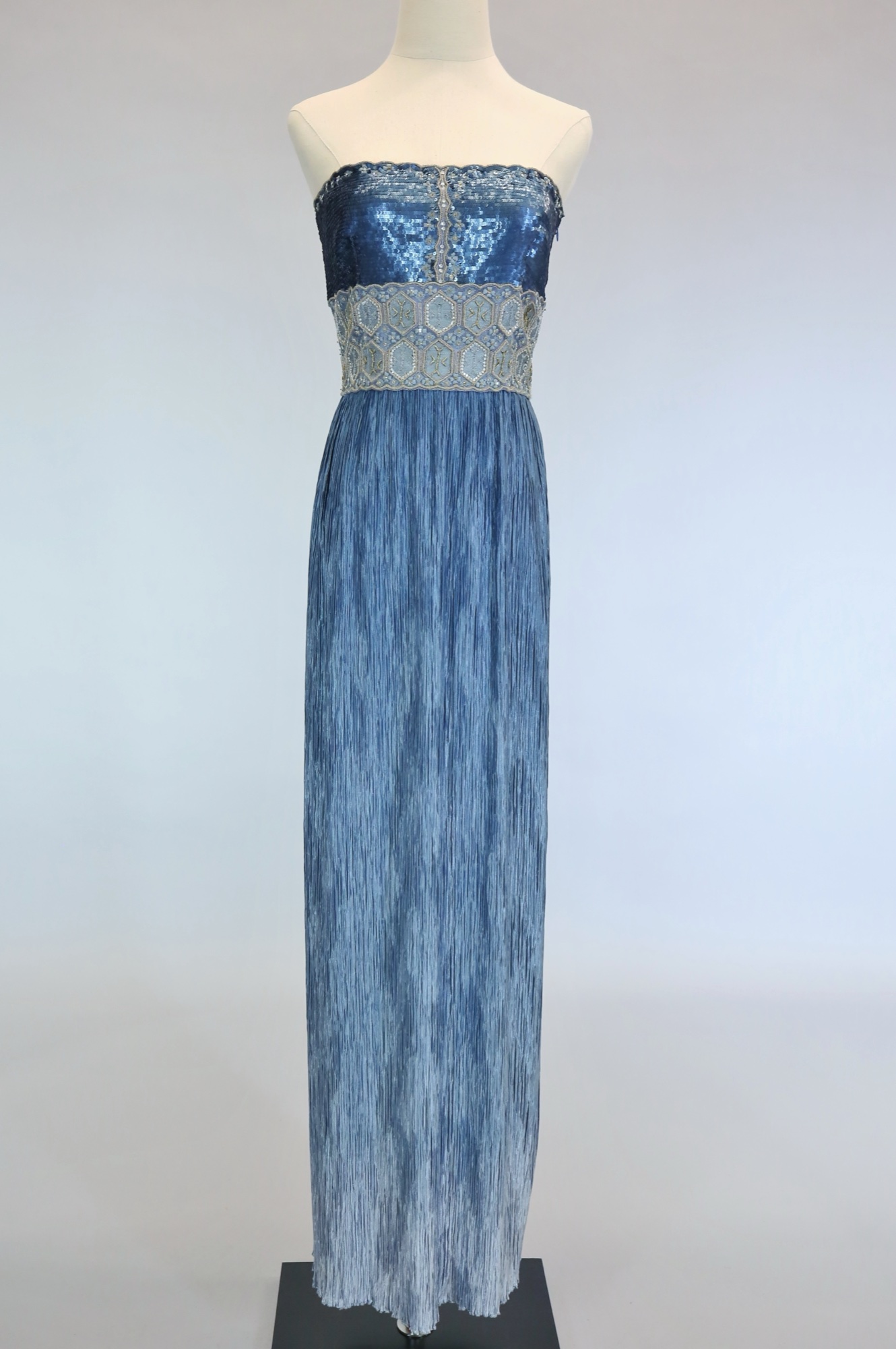 Blue pleated & embellished evening gown