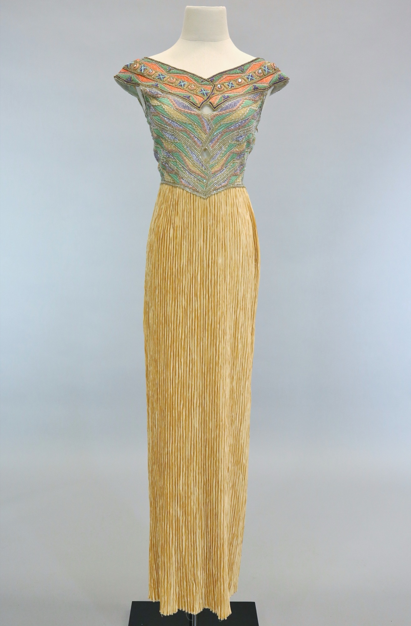 Peach pleated evening gown