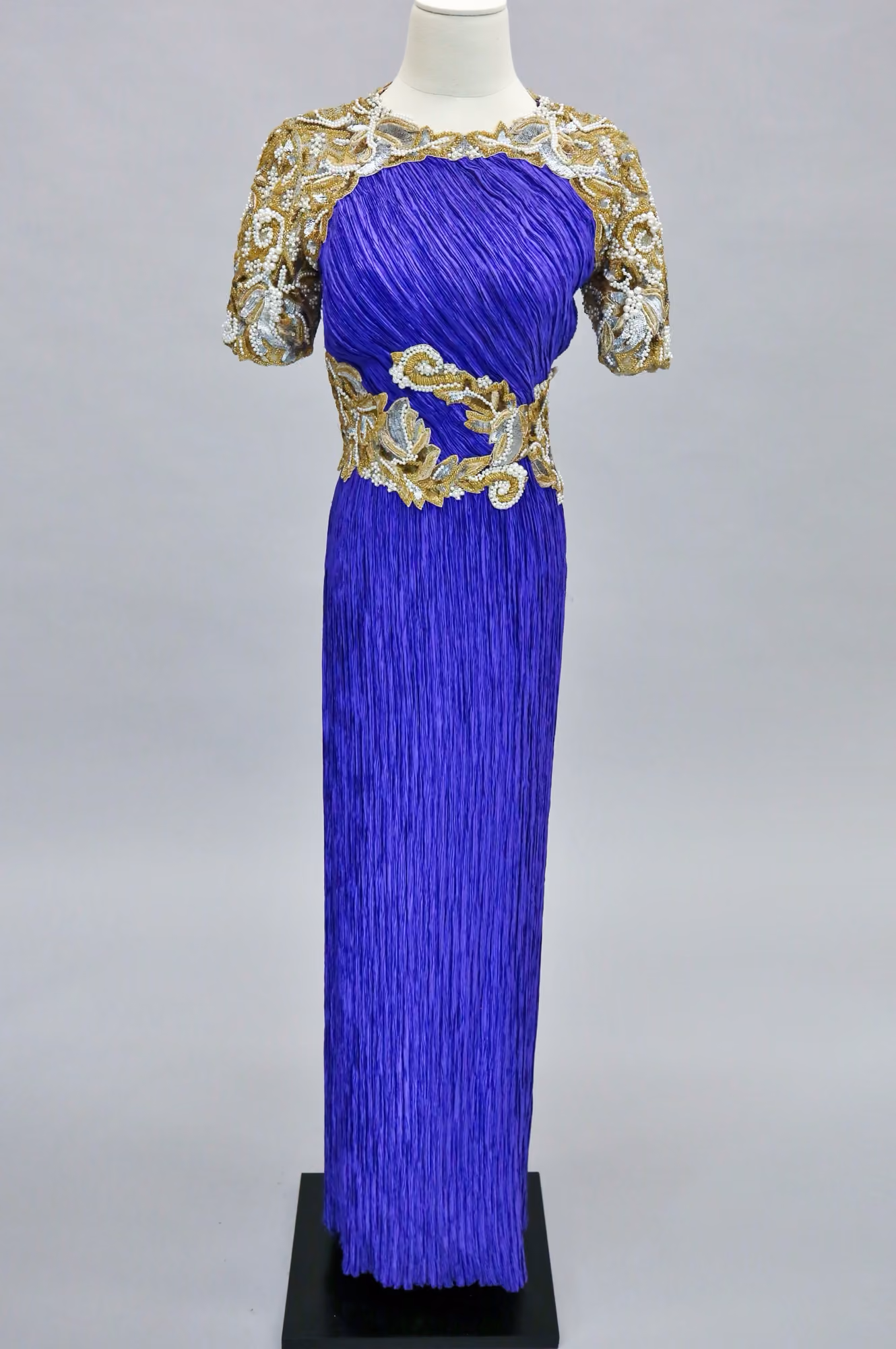 Purple pleated & embellished evening gown