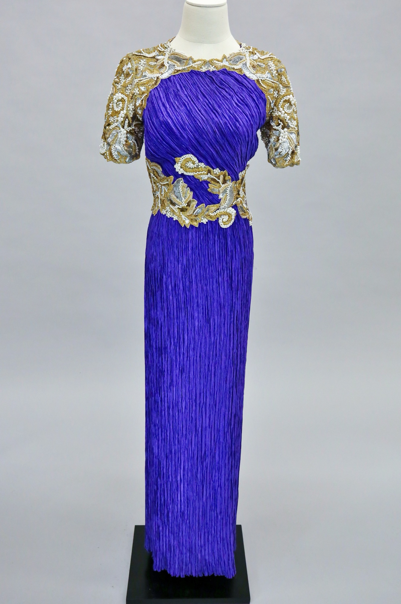 Purple pleated & embellished evening gown