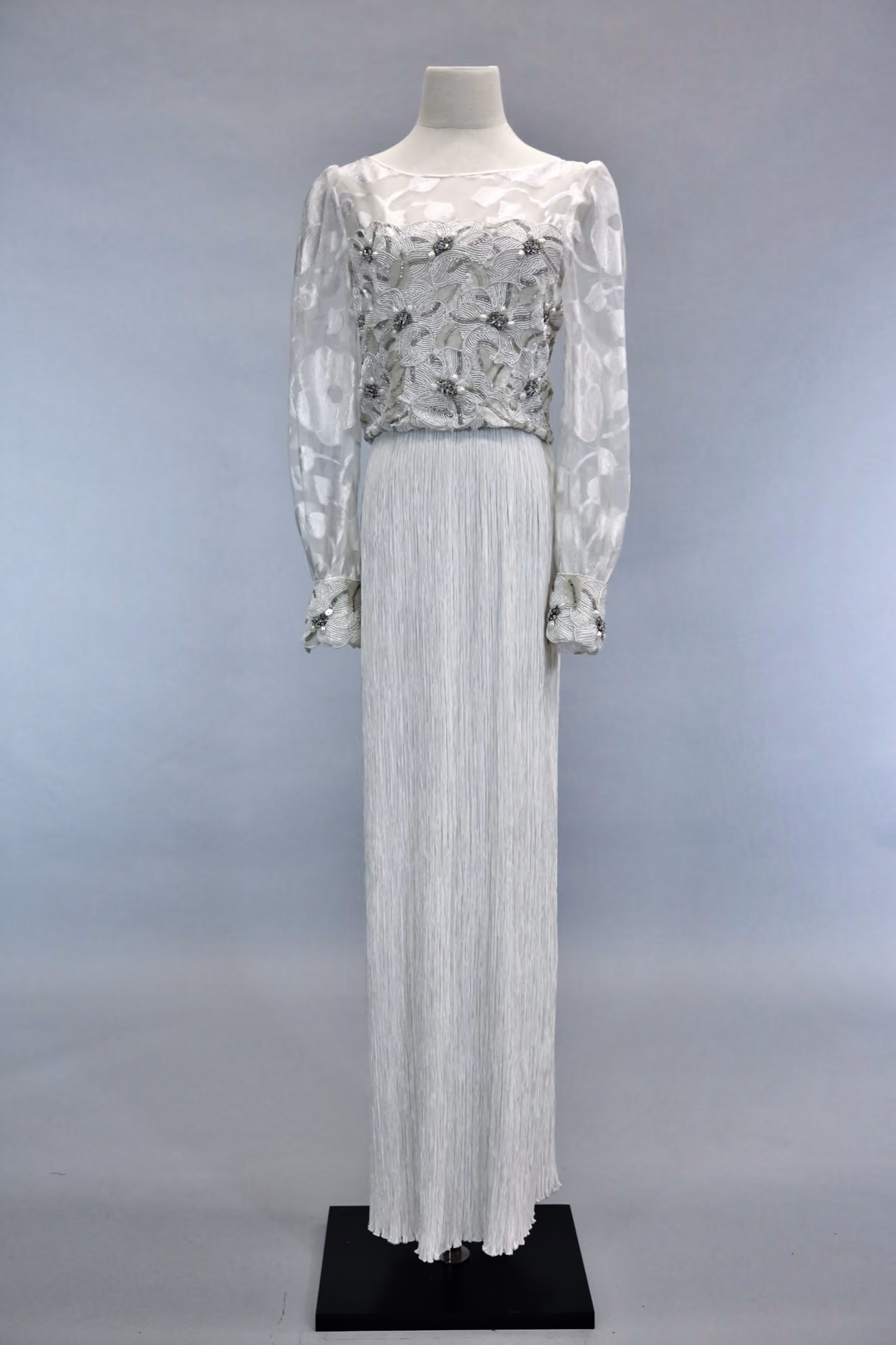 White pleated & embellished evening gown