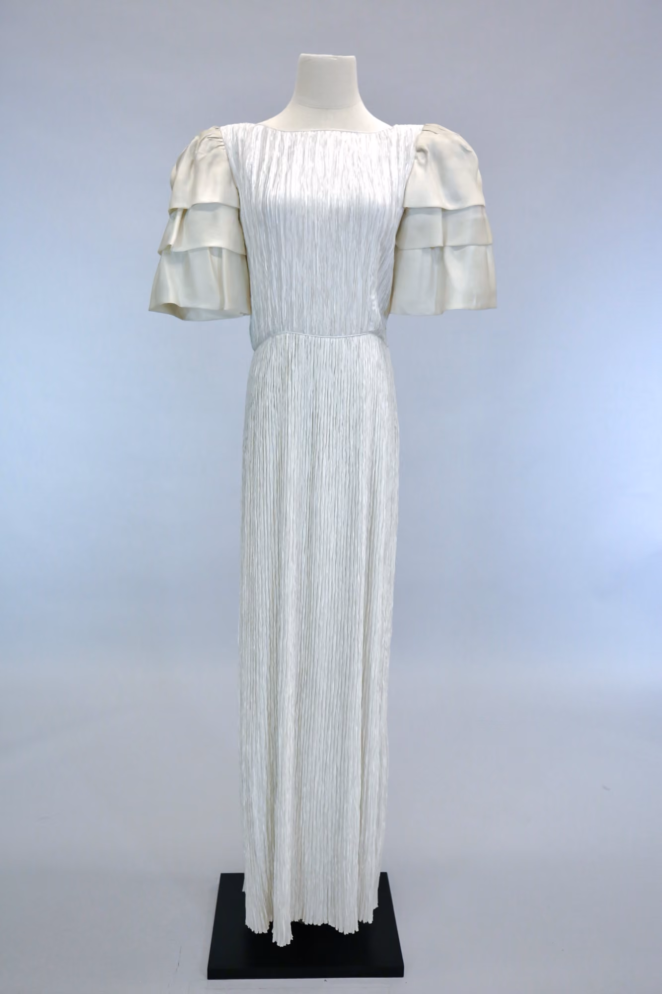 White pleated short sleeve evening gown