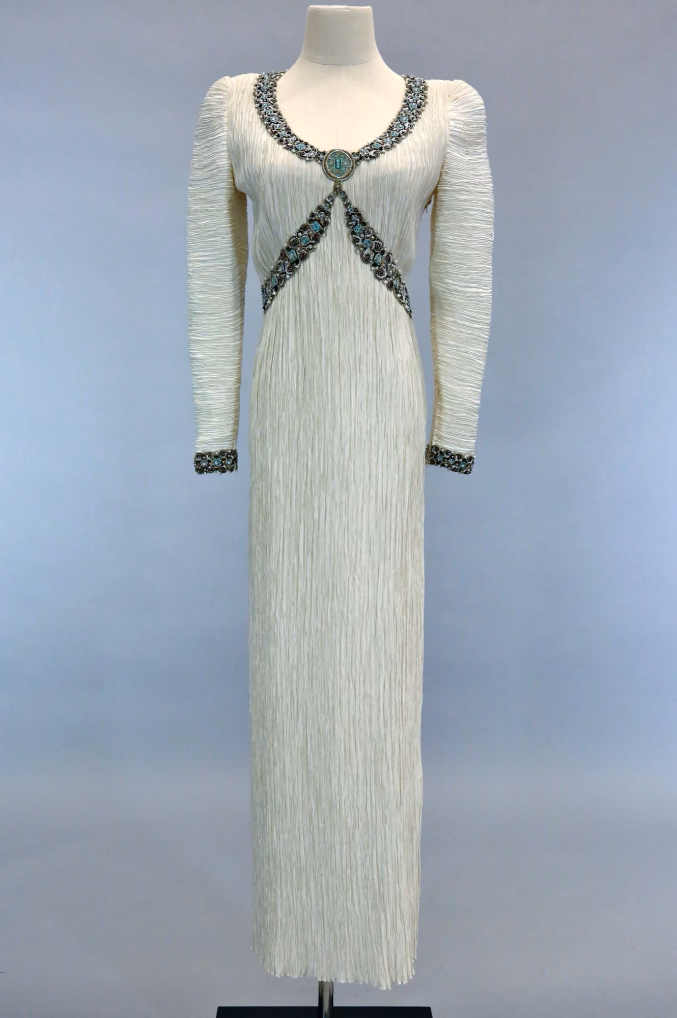 White pleated & beaded evening gown