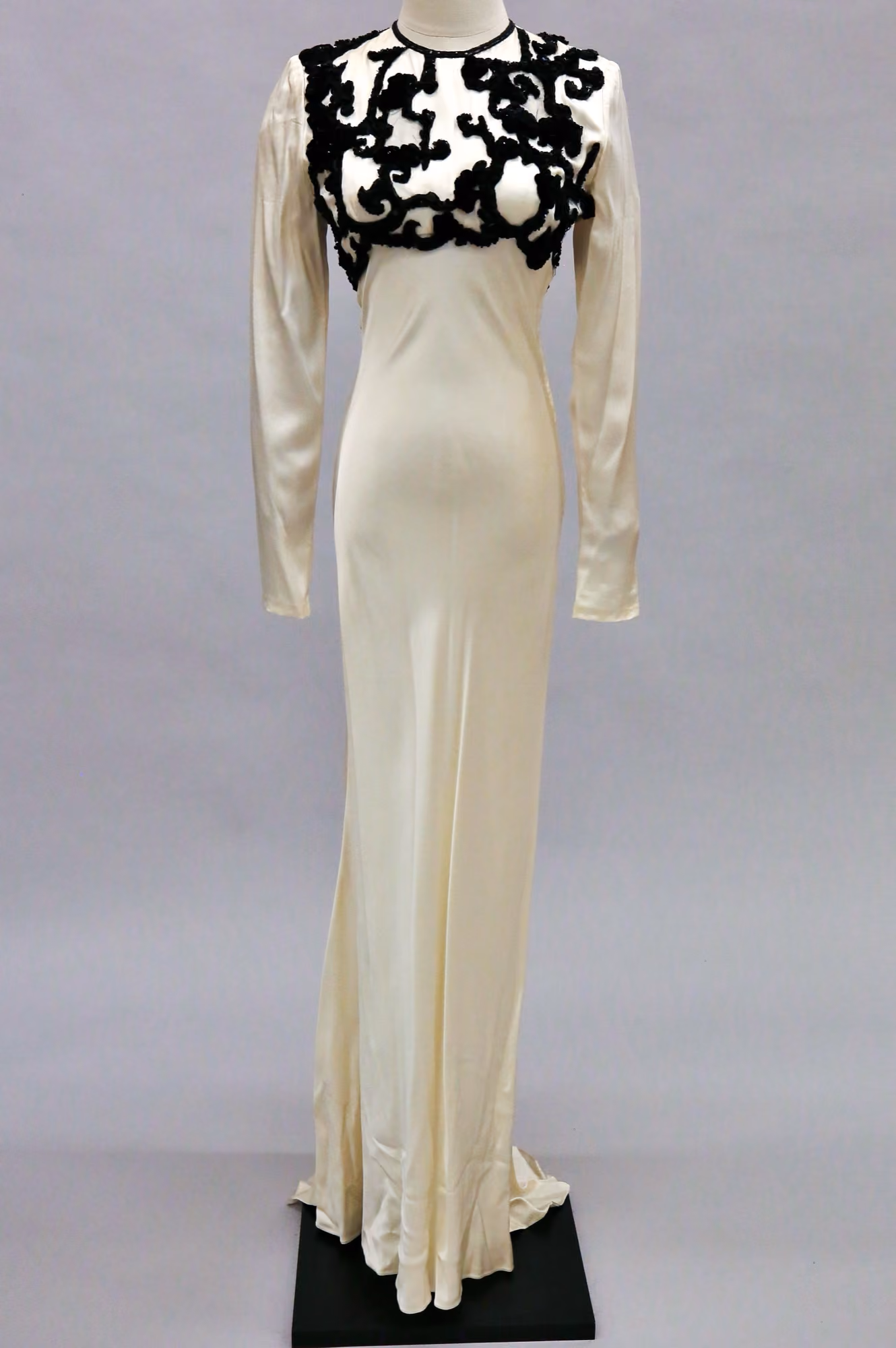 White satin evening gown with train