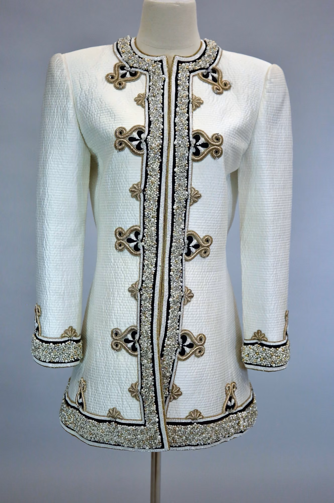 White & gold quilted jacket