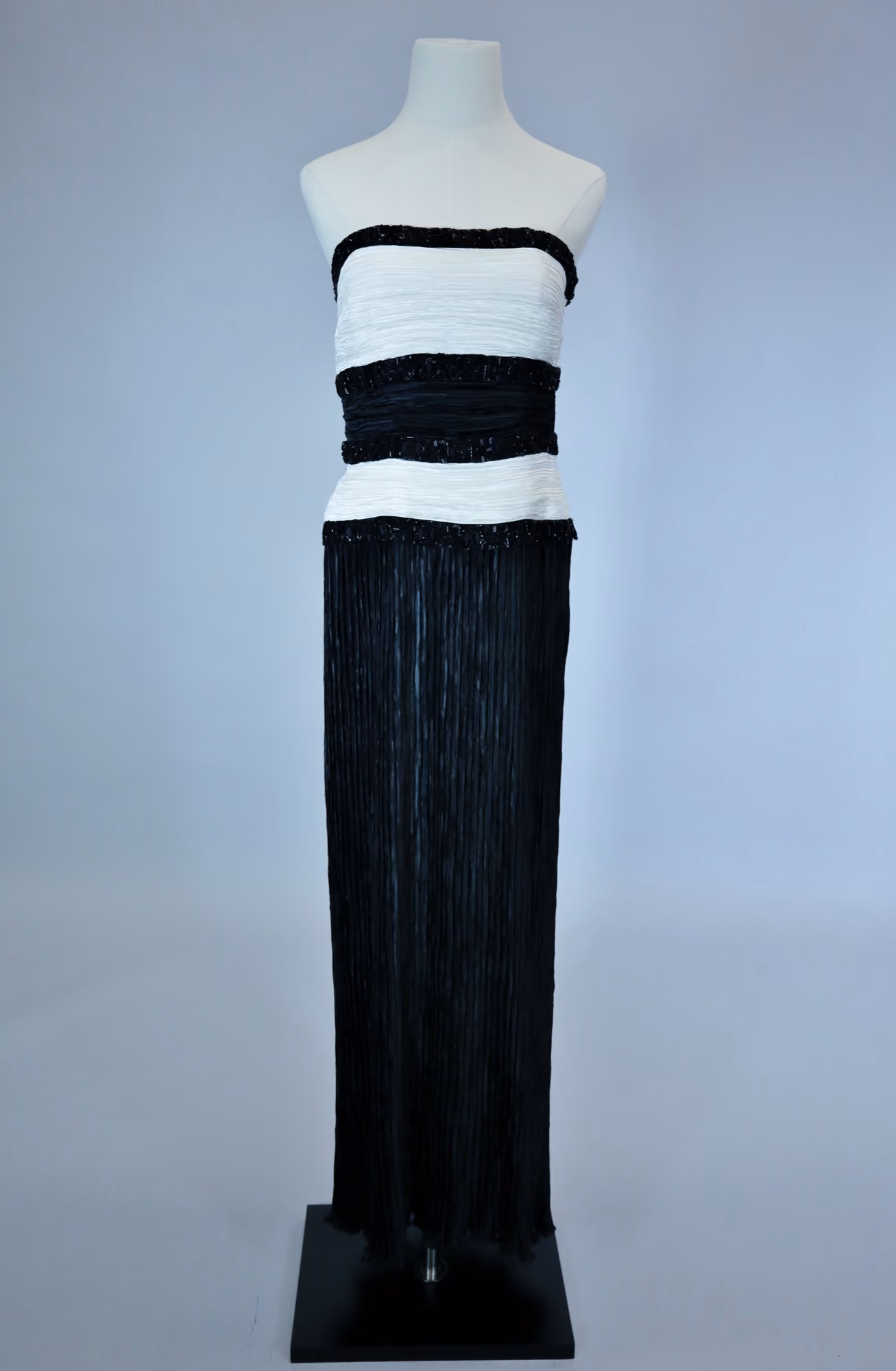 Black & white pleated strapless evening gown