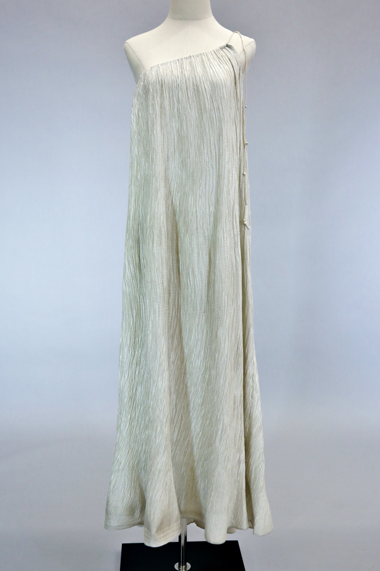 White pleated high low evening gown
