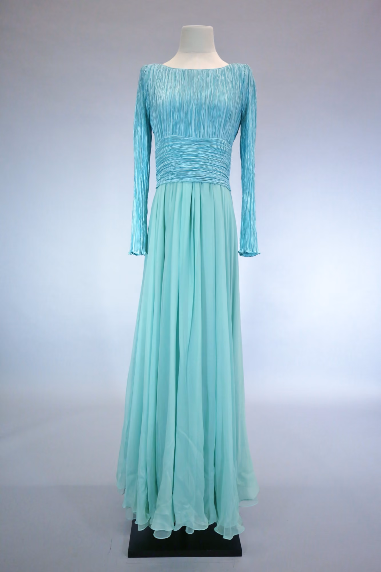 Turquoise pleated evening gown