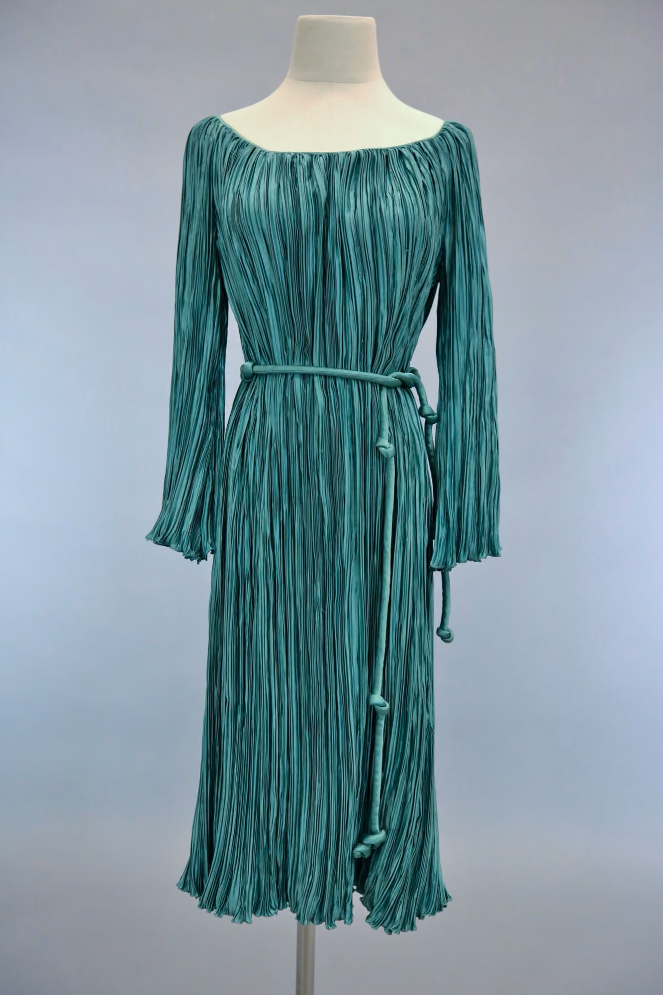 Green pleated belted cocktail dress