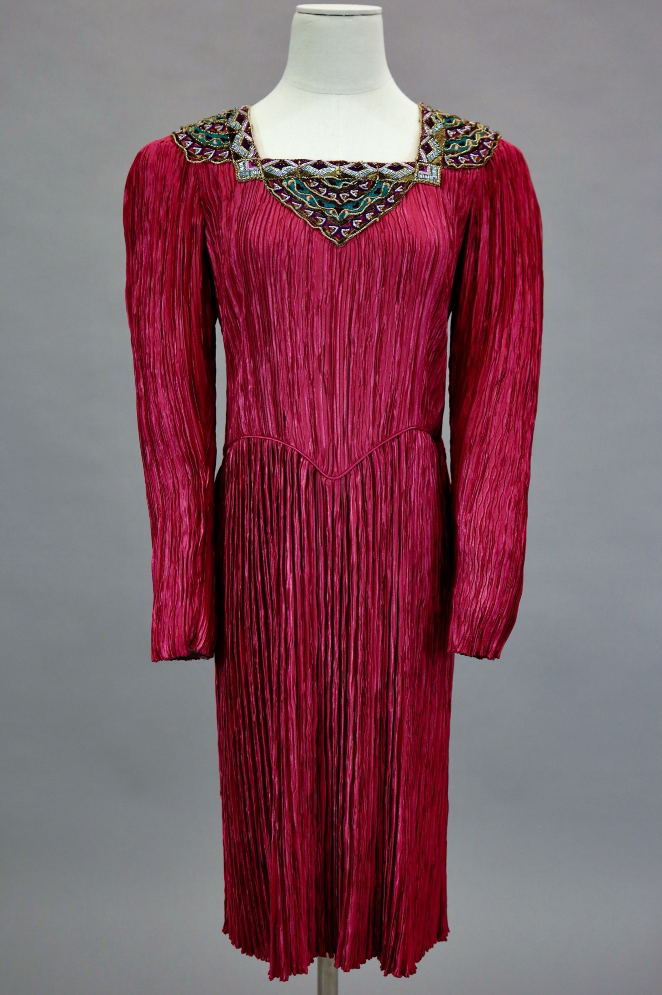 Red pleated cocktail dress