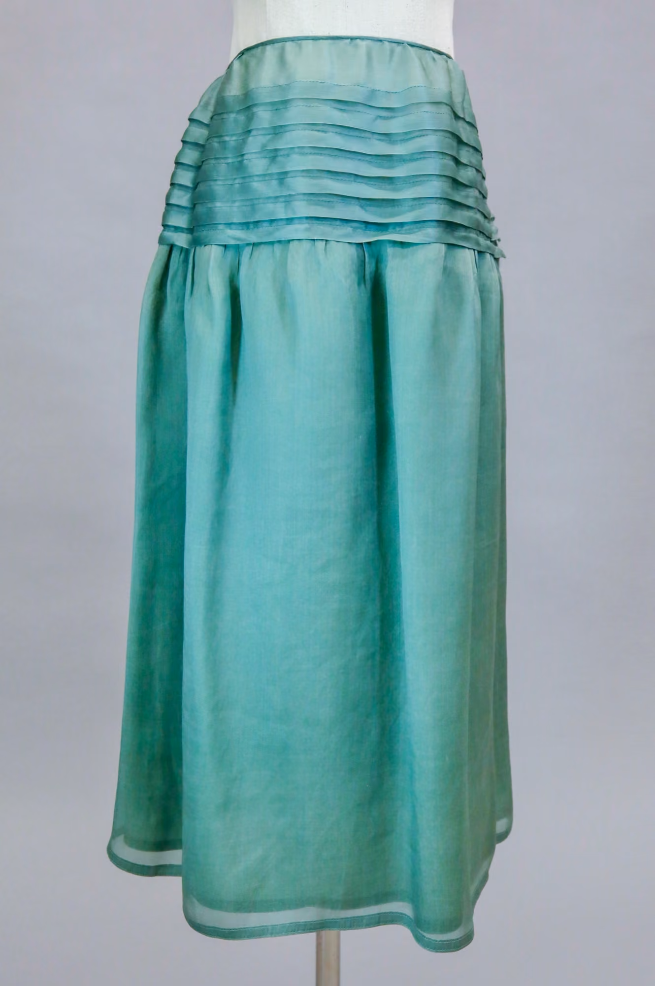 Green pleated skirt