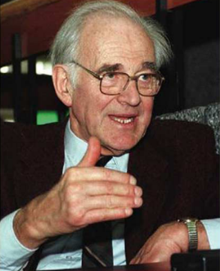 A picture containing person, man, indoor, sittingDescription automatically generated