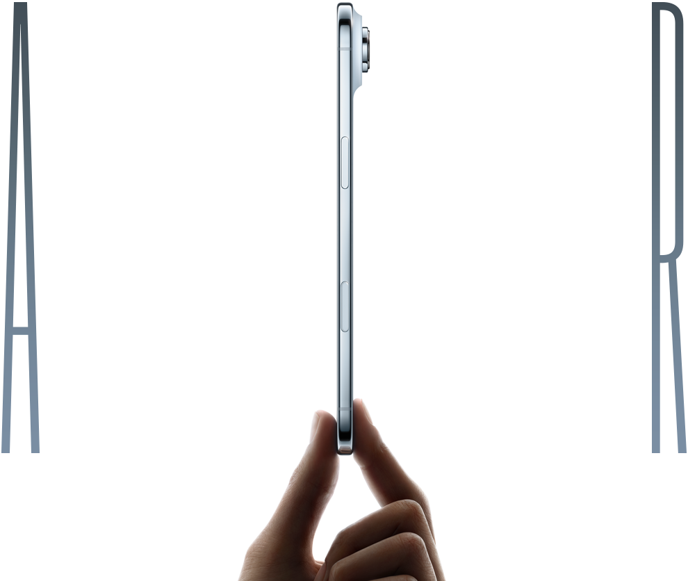 The word Air, spelled in thin chrome-colored letters. The I in Air is a side view of an iPhone Air device in Sky Blue being held upright between the thumb and pointer finger of a hand. The side view of the iPhone Air shows a button and part of a camera peeking out from the top right.
