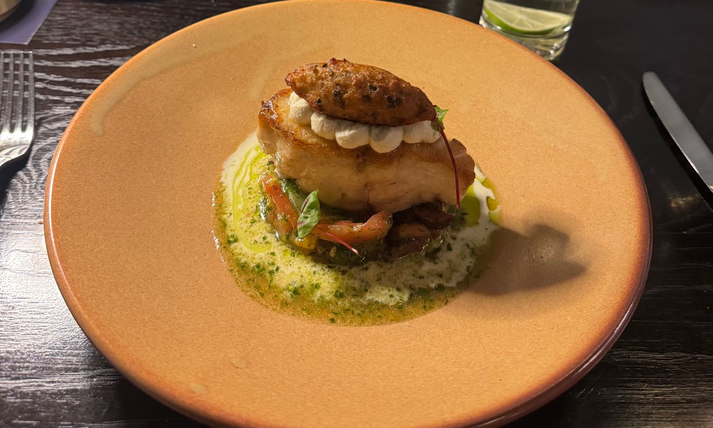 A plate of food on a tableAI-generated content may be incorrect.