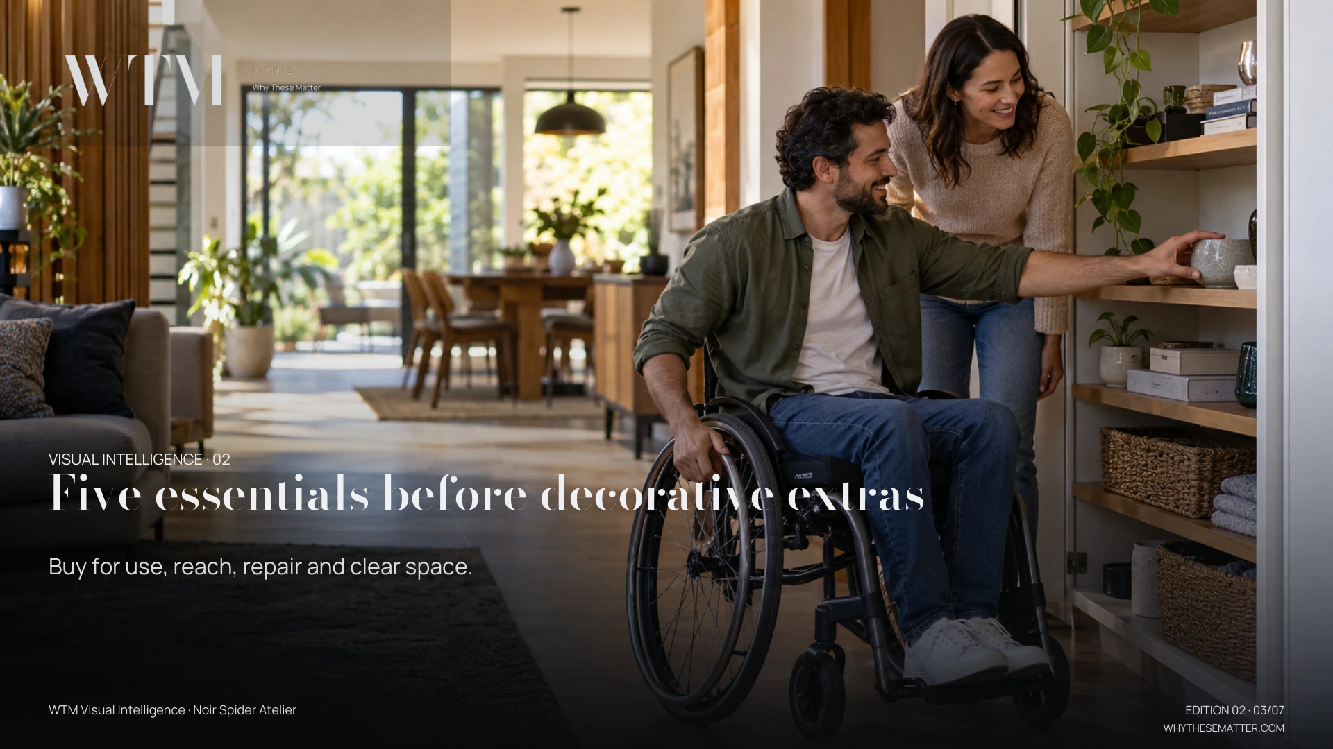 Illustrative scene: a wheelchair-using male designer and woman partner reviewing easy reach shelving beside a clear route, practical welcoming home. Decision: Buy for use, reach, repair and clear space.