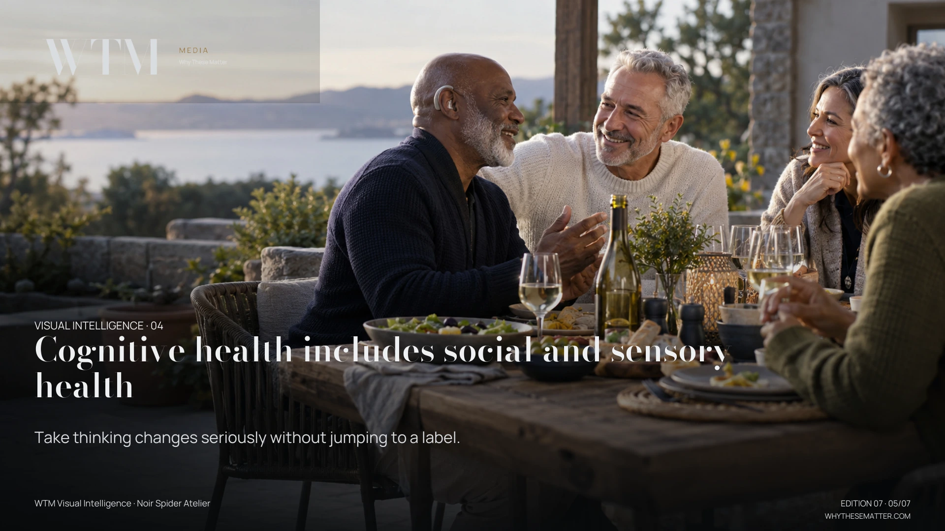 Illustrative scene: an older interracial gay couple talking warmly with friends around a shared outdoor table, a discreet hearing aid visible. Decision: Take thinking changes seriously without jumping to a label.