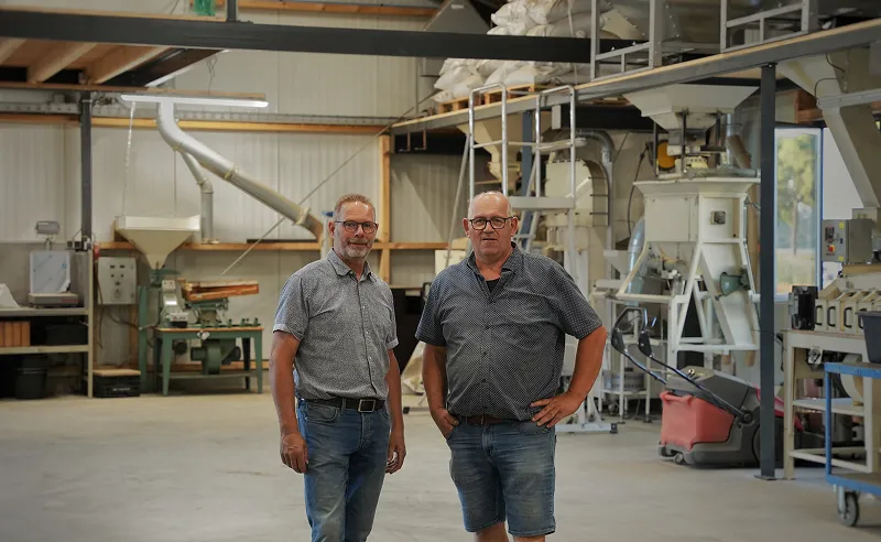 Jan and Bram Heijboer standing in fabric