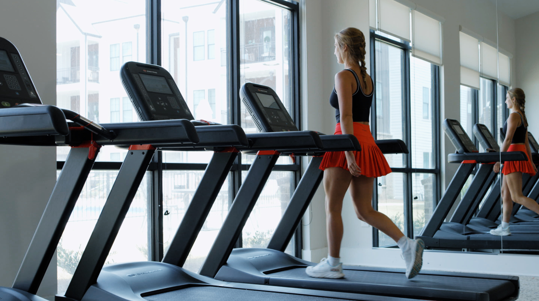 Girl walking on treadmill