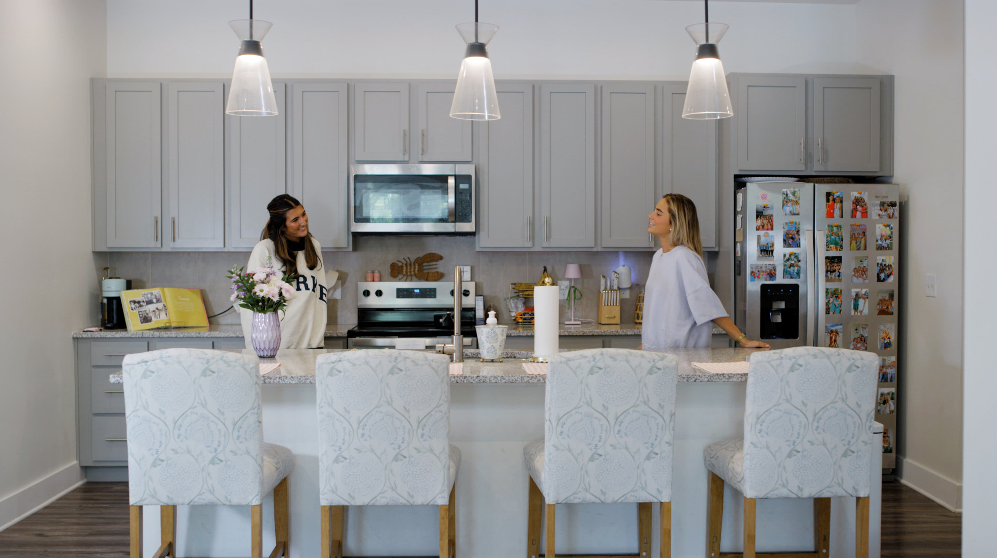Girls chatting in kitchen