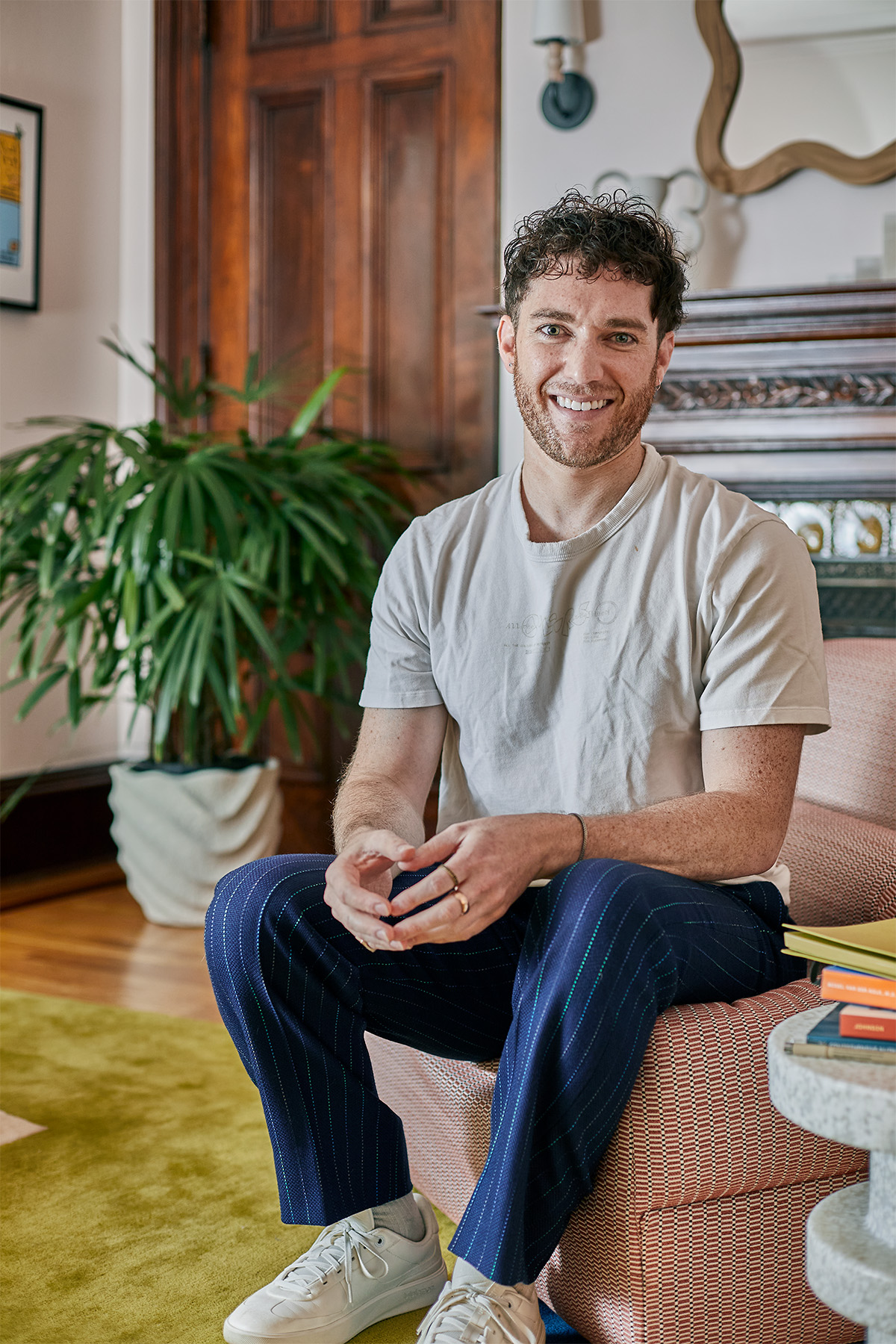 Alimente founder and resident dietitian Jason Kashdan posing in the therapy room at Alimente.