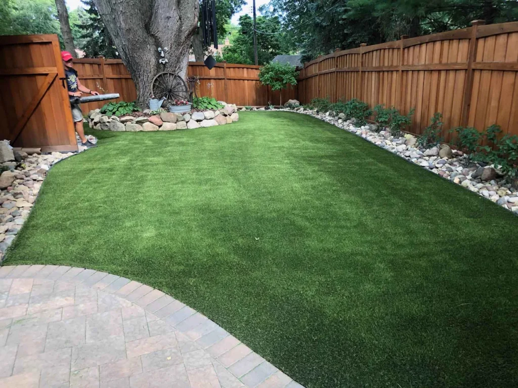 beautiful photo of an urban house with artificial turf