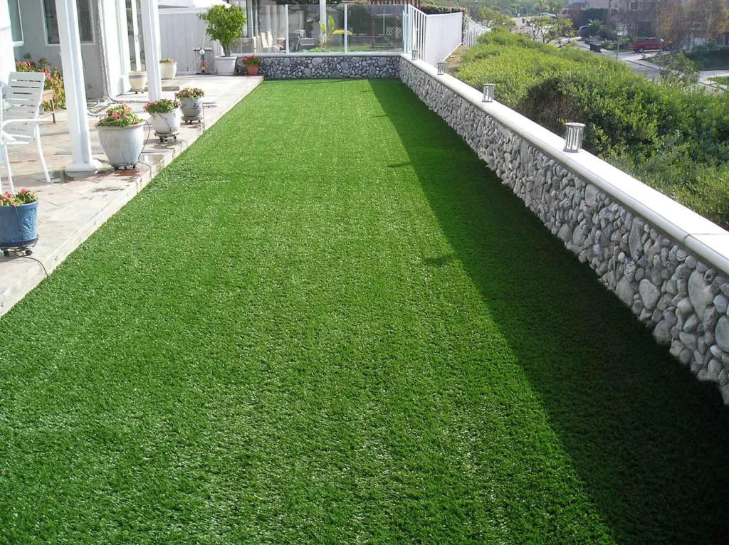 beautiful photo of an urban house with artificial turf