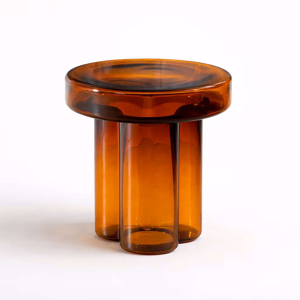 An amber-colored glass end table against a white background.