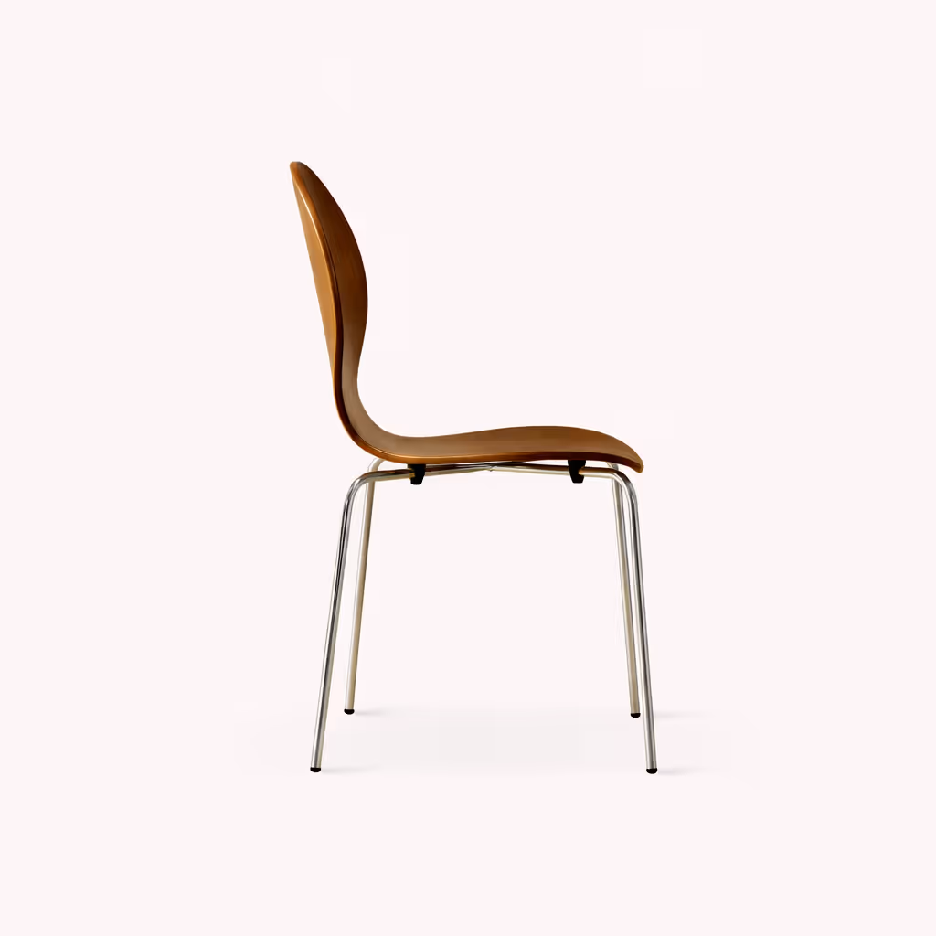 A modern walnut stackable side chair against a white background
