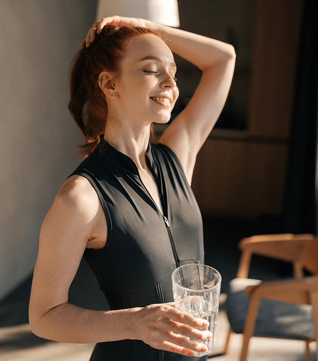Women Drinking From Glass And Relaxing.