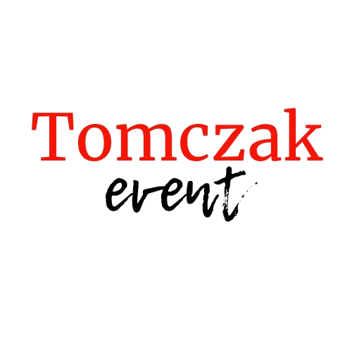 A red and white sign that says Tomczak.
