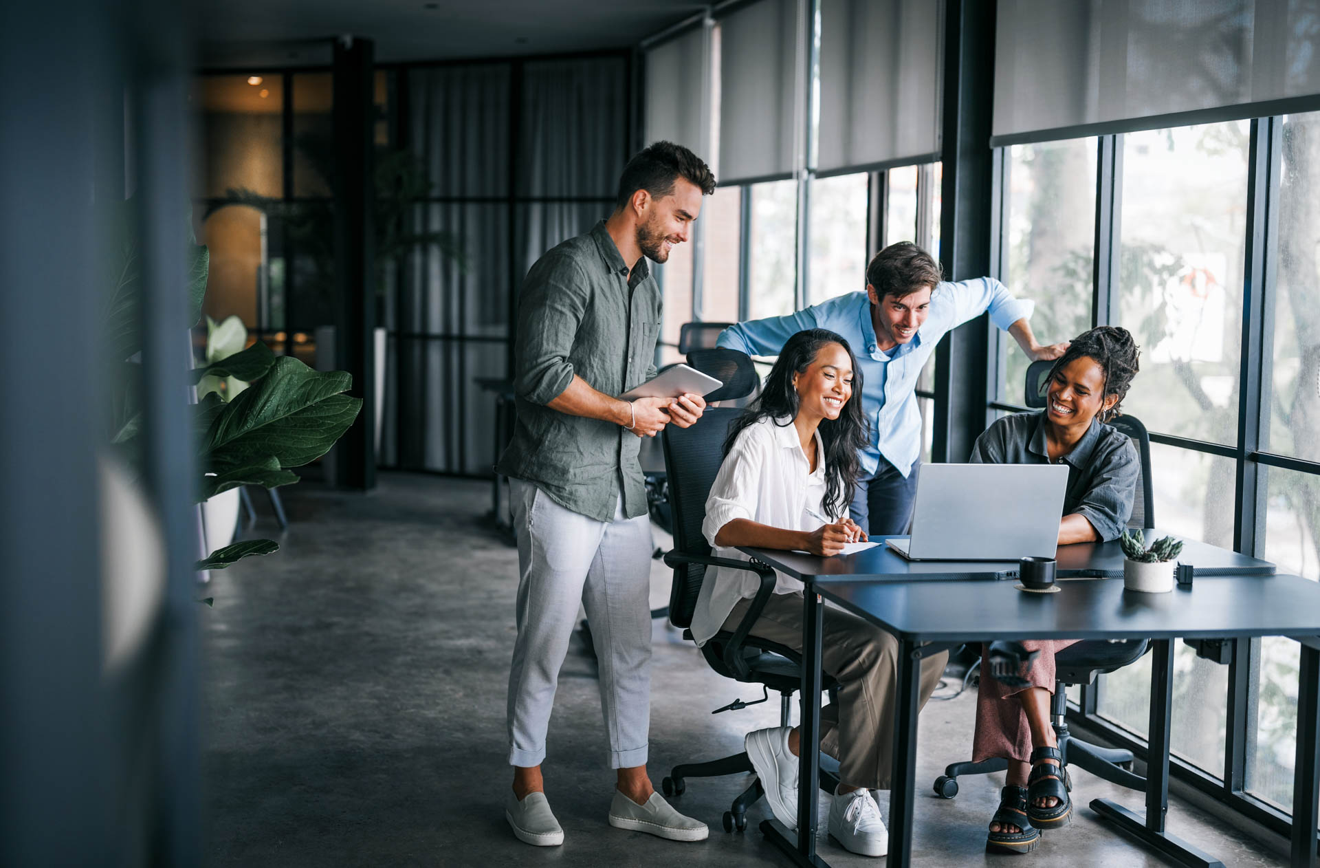 multiple people in a discussion in an office