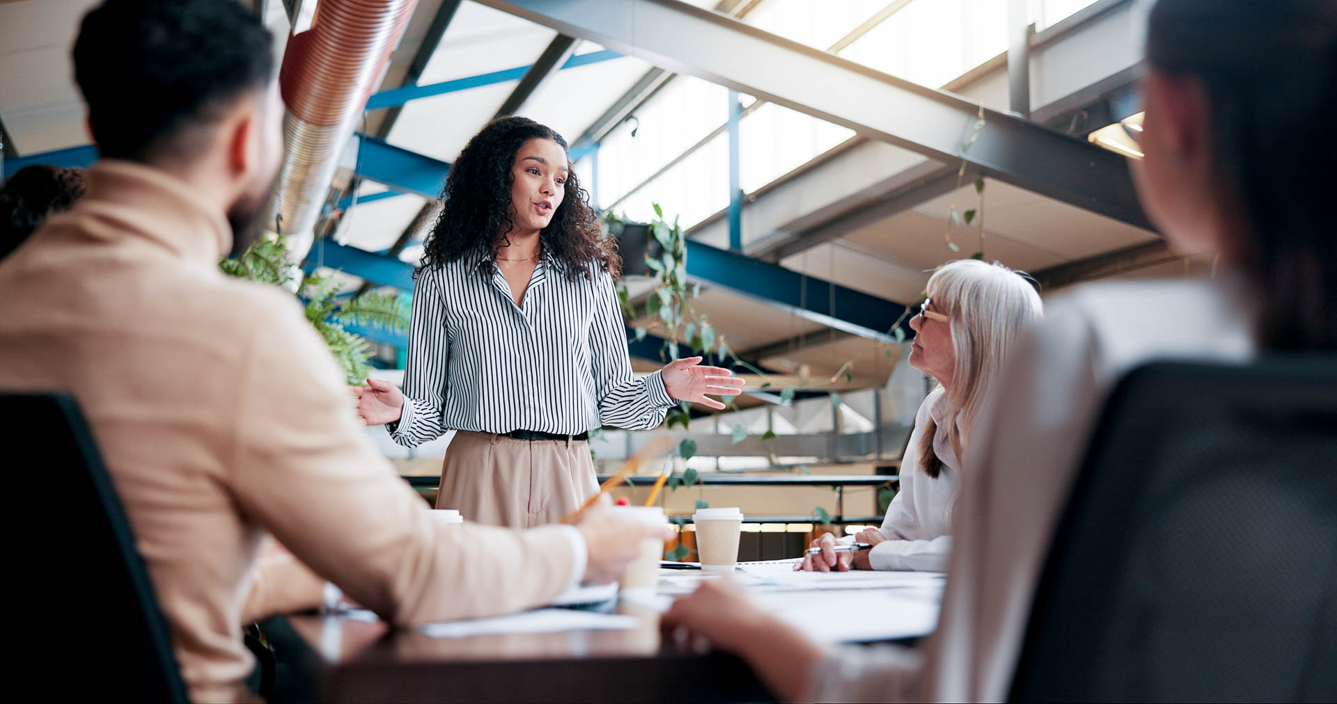 multiple people in a discussion in an office