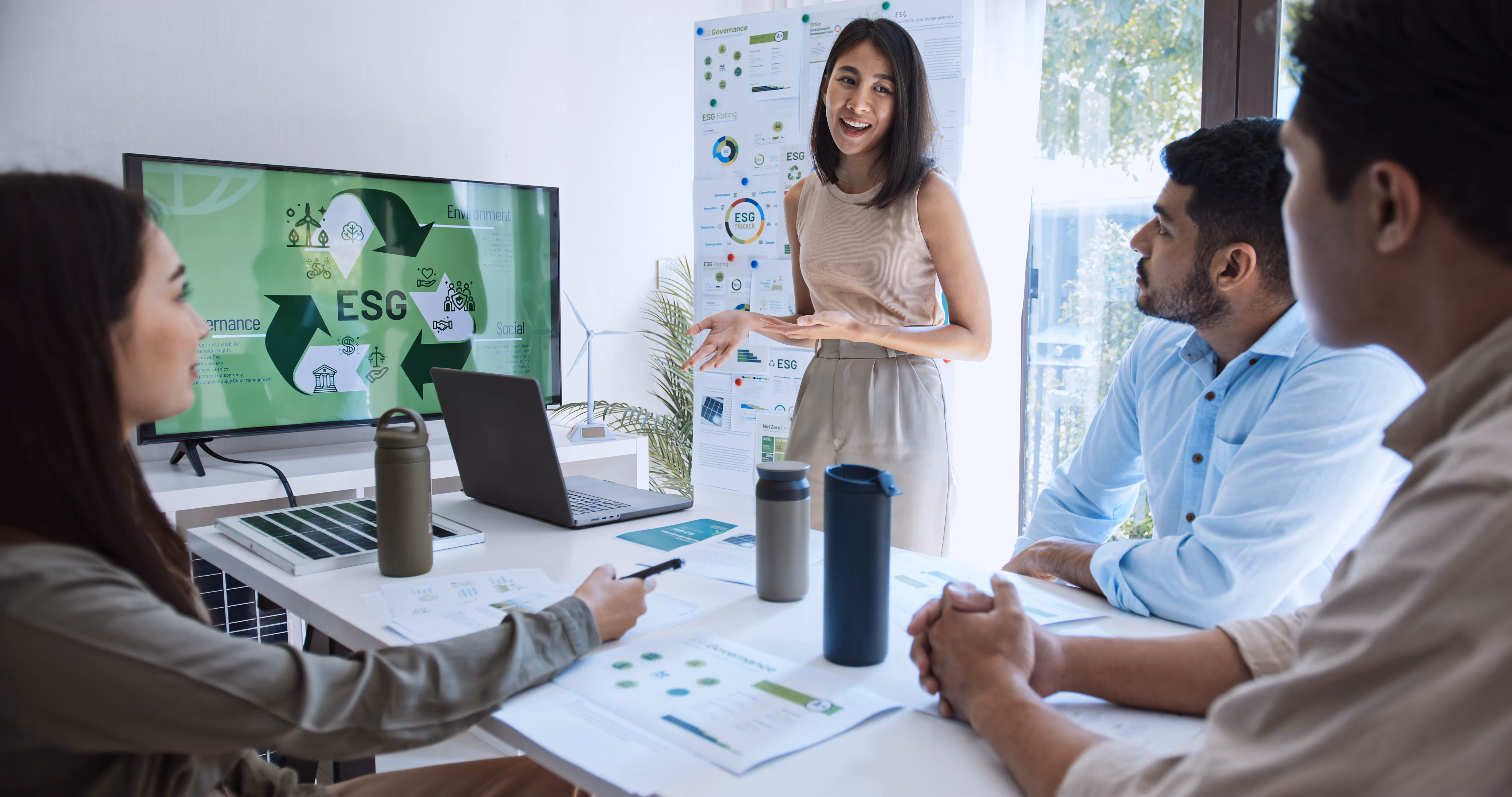 group of 4 people working in an office