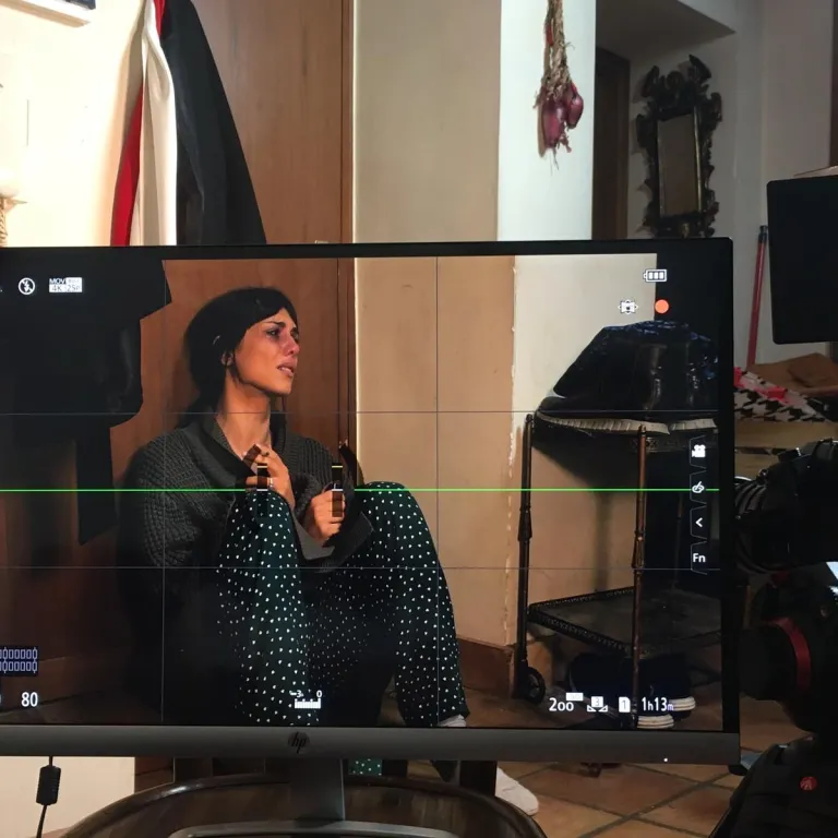 Woman on a monitor on a film set 